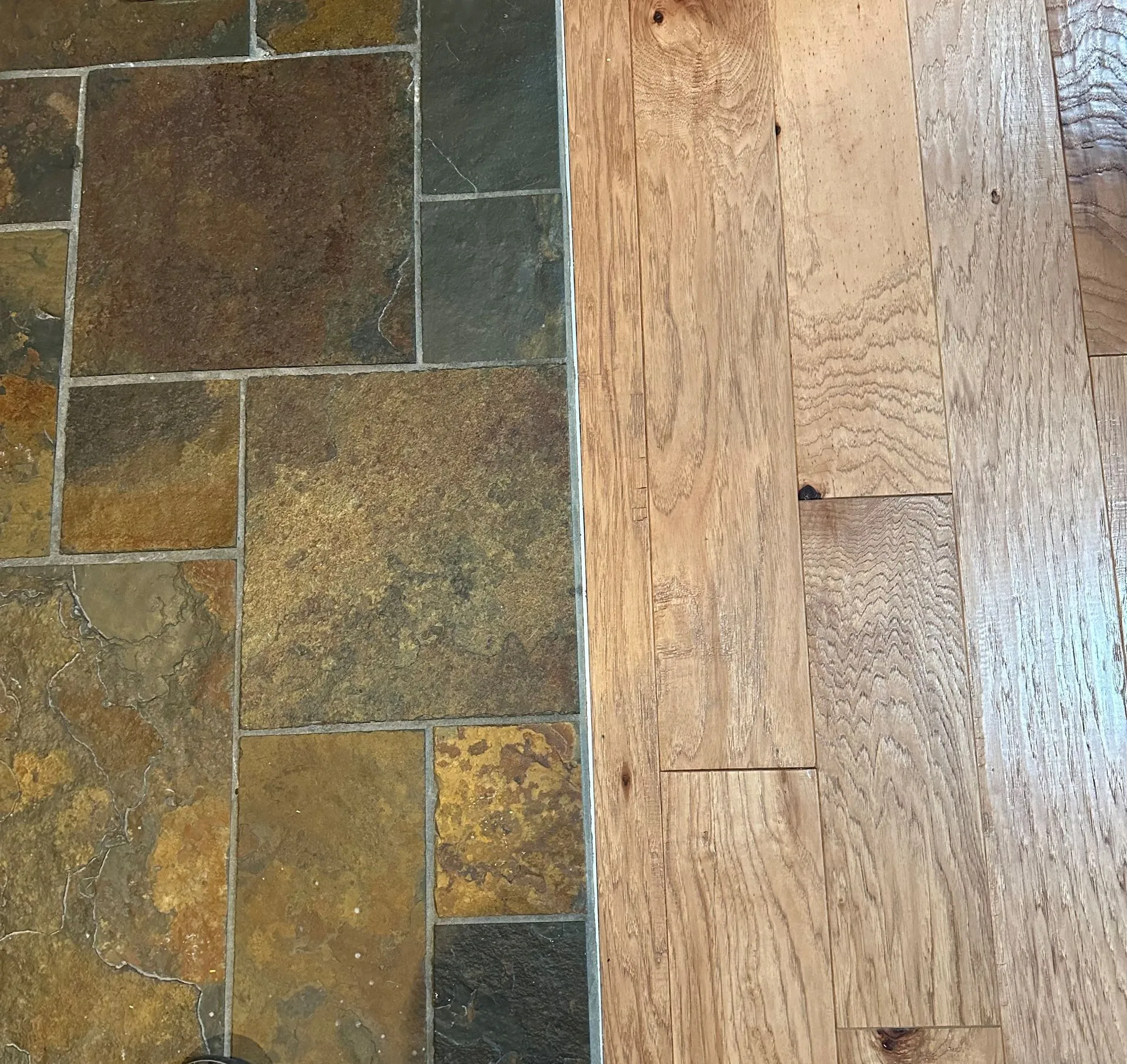 Slate tile and hardwood flooring transition detail